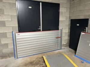 Installation of a flood barrier at a Brisbane apartment building