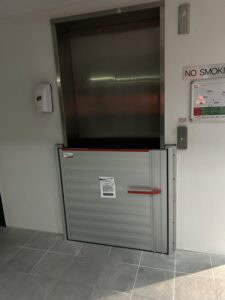 Deployed flood barrier at a Brisbane apartment building